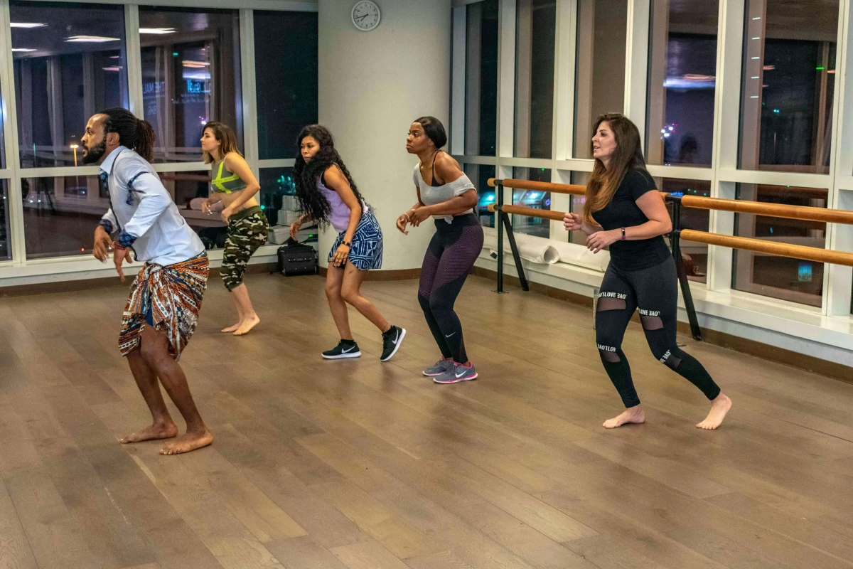 Group of women doing zumba in a studio
